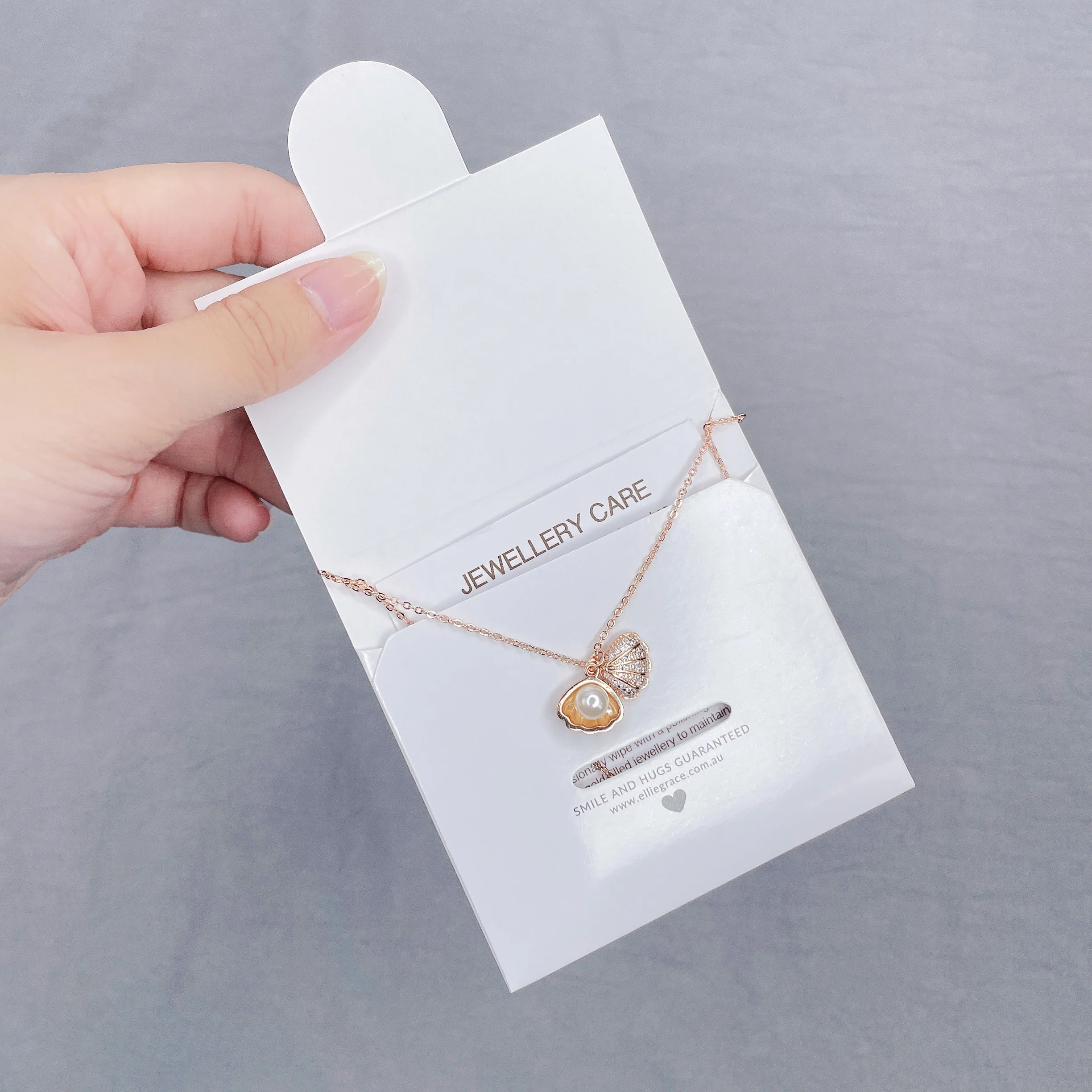 Custom logo glossy jewelry envelope packaging care instruction cards necklace package pouch cards for small business