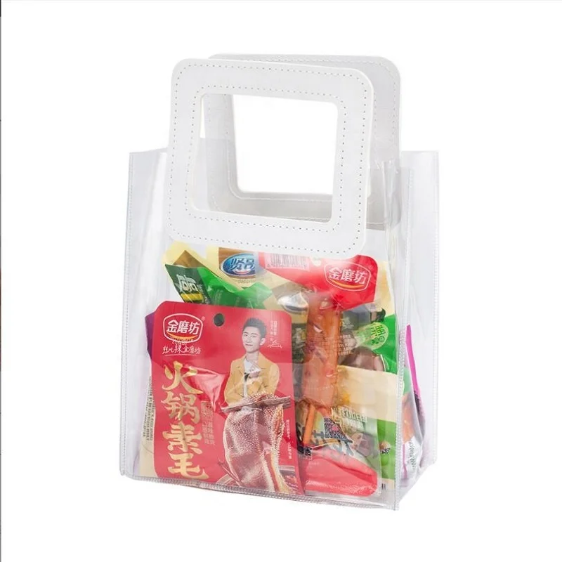 Wholesale hot sale transparent pvc hand bag waterproof beautiful clear plastic handbag tote shopping purse for woman with print