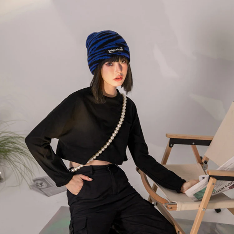 Update fashion hot-sale pure color direct selling warm windproof knitted hat for winter