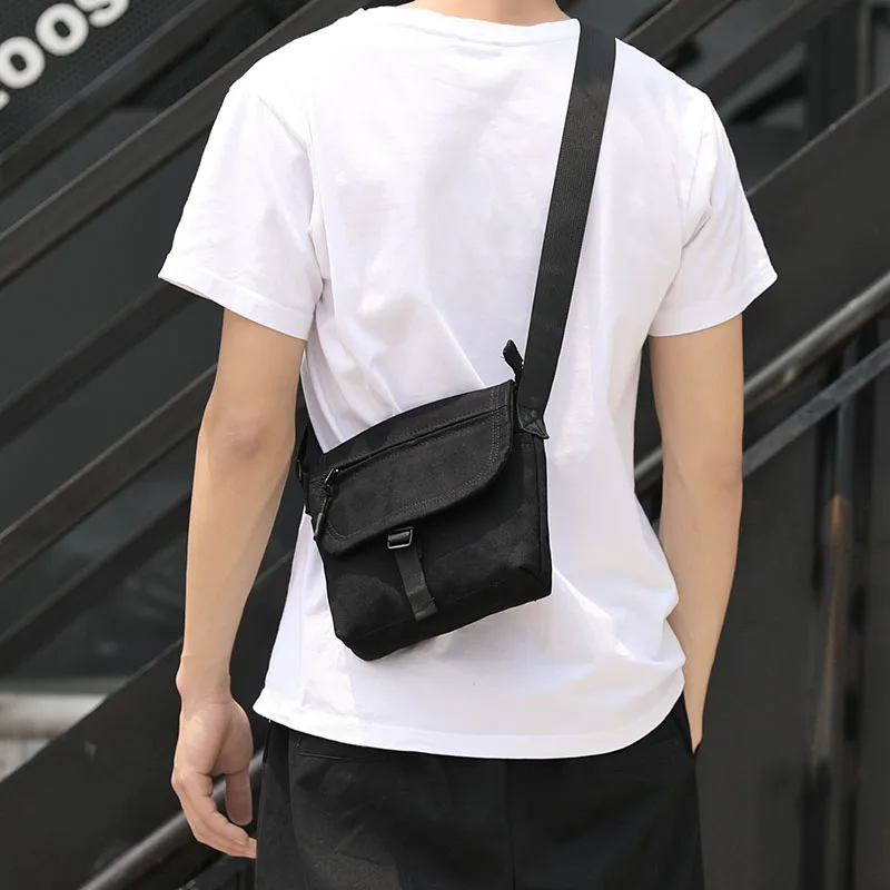 Japanese style pure color contracted cross-body bag men and women mini one-shoulder bag out of the backpack