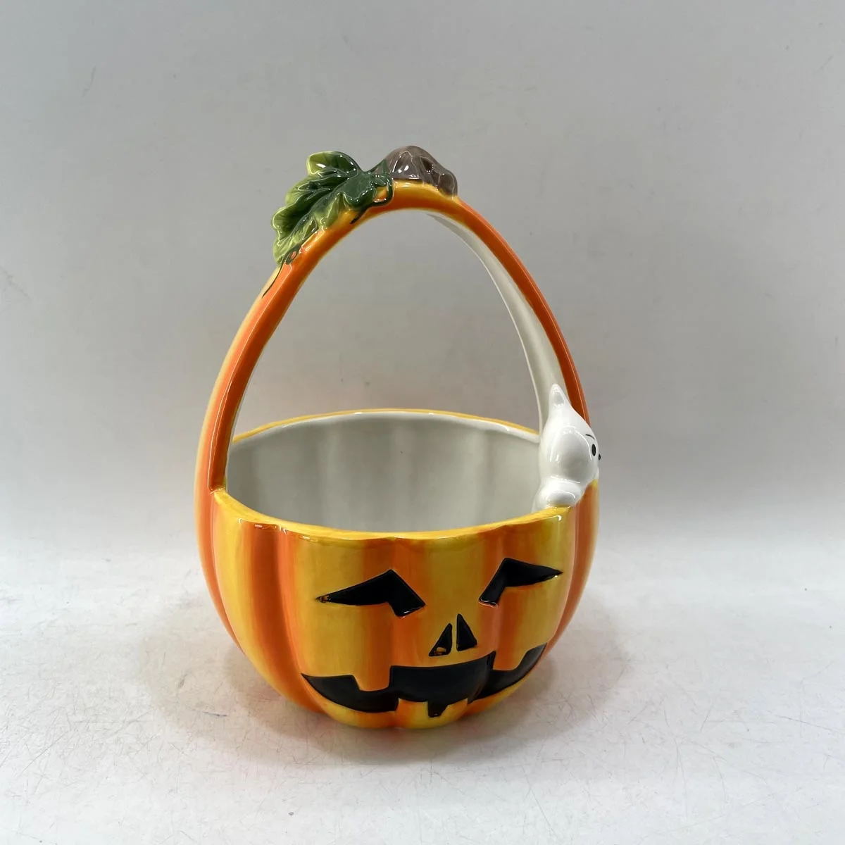 Handpainted ceramic pumpkin shaped basket with ghost