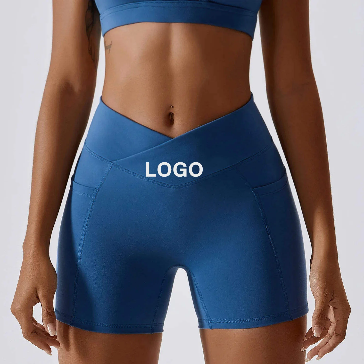 Oem Sportswear Quick Dry Nude Hip-lifting Pocket Solid Color Running Fitness Shorts Crossed Waist Tight Yoga Shorts