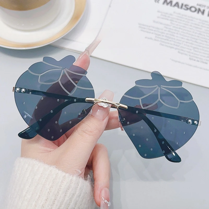 Trendy Unisex Gold Rimless Sunglasses with UV400 Red Lenses Strawberry Style Fashionable Eyewear for Parties