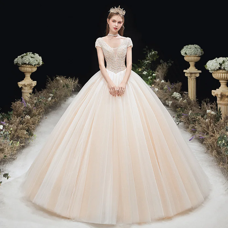 Luxury robe de mariage Simple Heavy Beaded Pearls Wedding Dress Half Sleeve Bridal Gowns