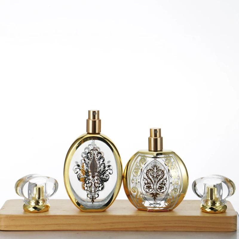 Factory Supply 50ml Arabic Pattern Flat Oval Classic Perfume Glass Packaging Fine Mist Perfume Spray Bottle with Luxury Lid