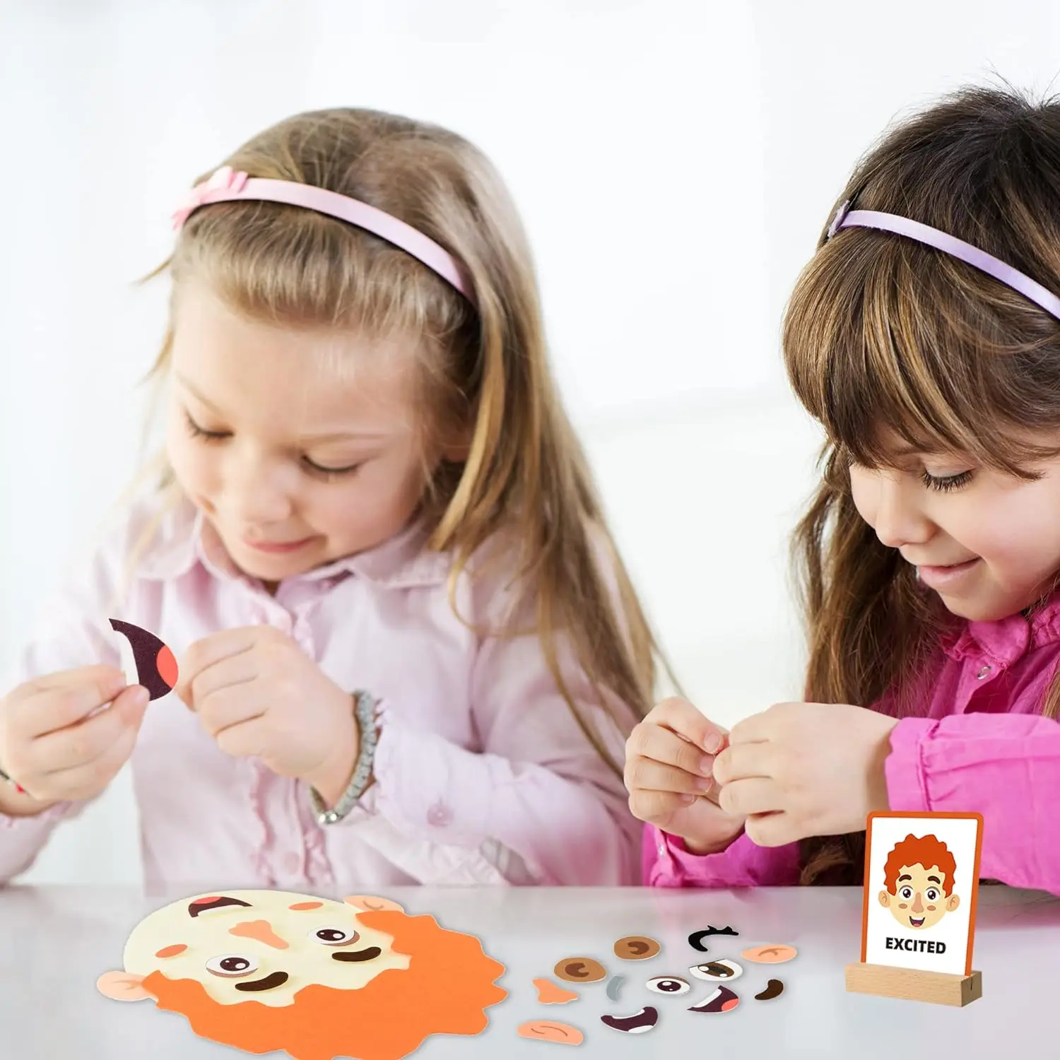 Kindergarten DIY teaching early education character change expression communication paste felt puzzle learning