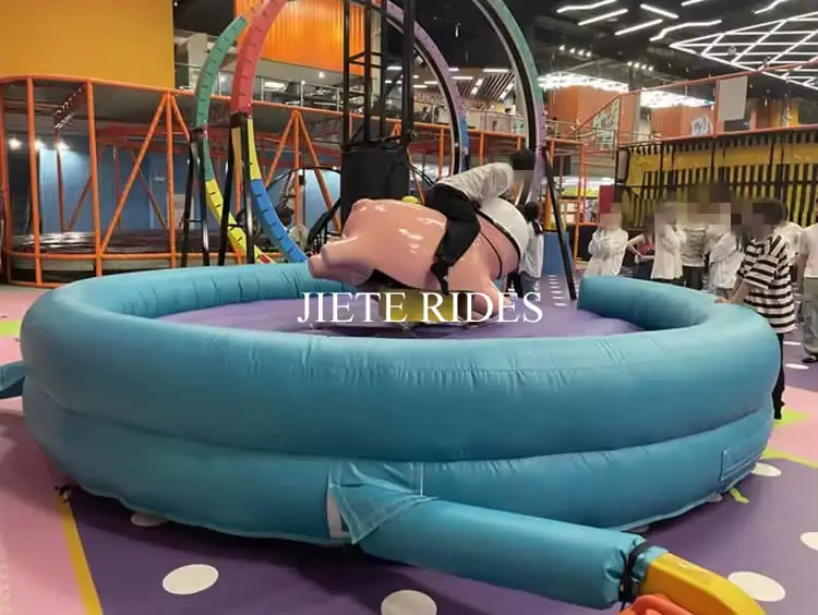 Discount Commercial sport game mechanical bull riding challenge machine inflatable rodeo bull/pig ride