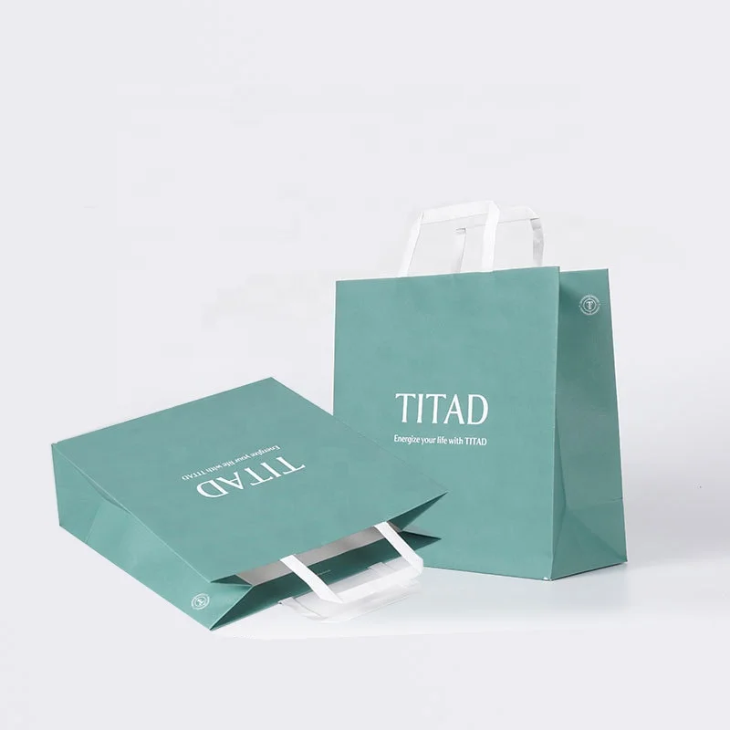 China Factory Wholesale Price Custom clothing Drawstring Luxury Shopping Bag Paper Bags With Your Own Logo Handle