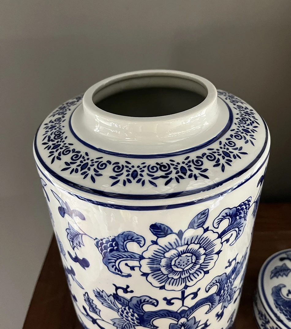 Porcelain Ginger Jar with Blue and White Peony Design A Dutch Delft blue and white baluster vase and cover
