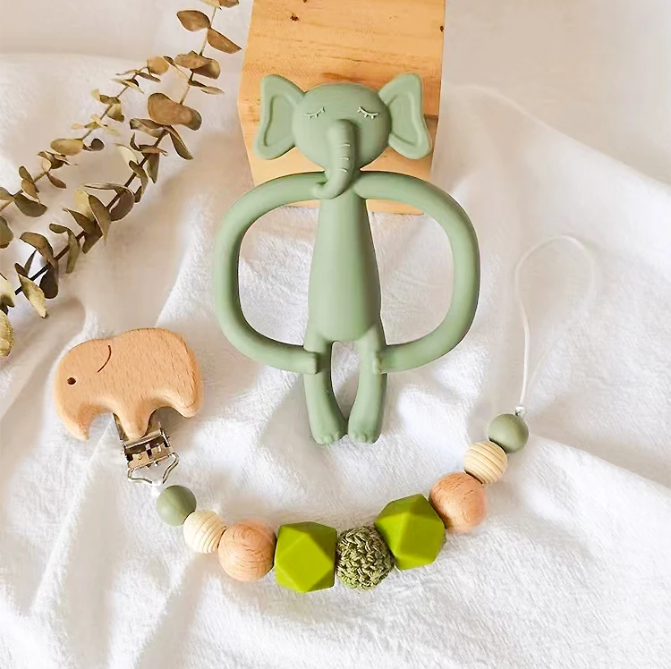 High quality elephant shape babe teething ring cartoon infant rattle donut chewable senory toy BPA-free silicone baby teether