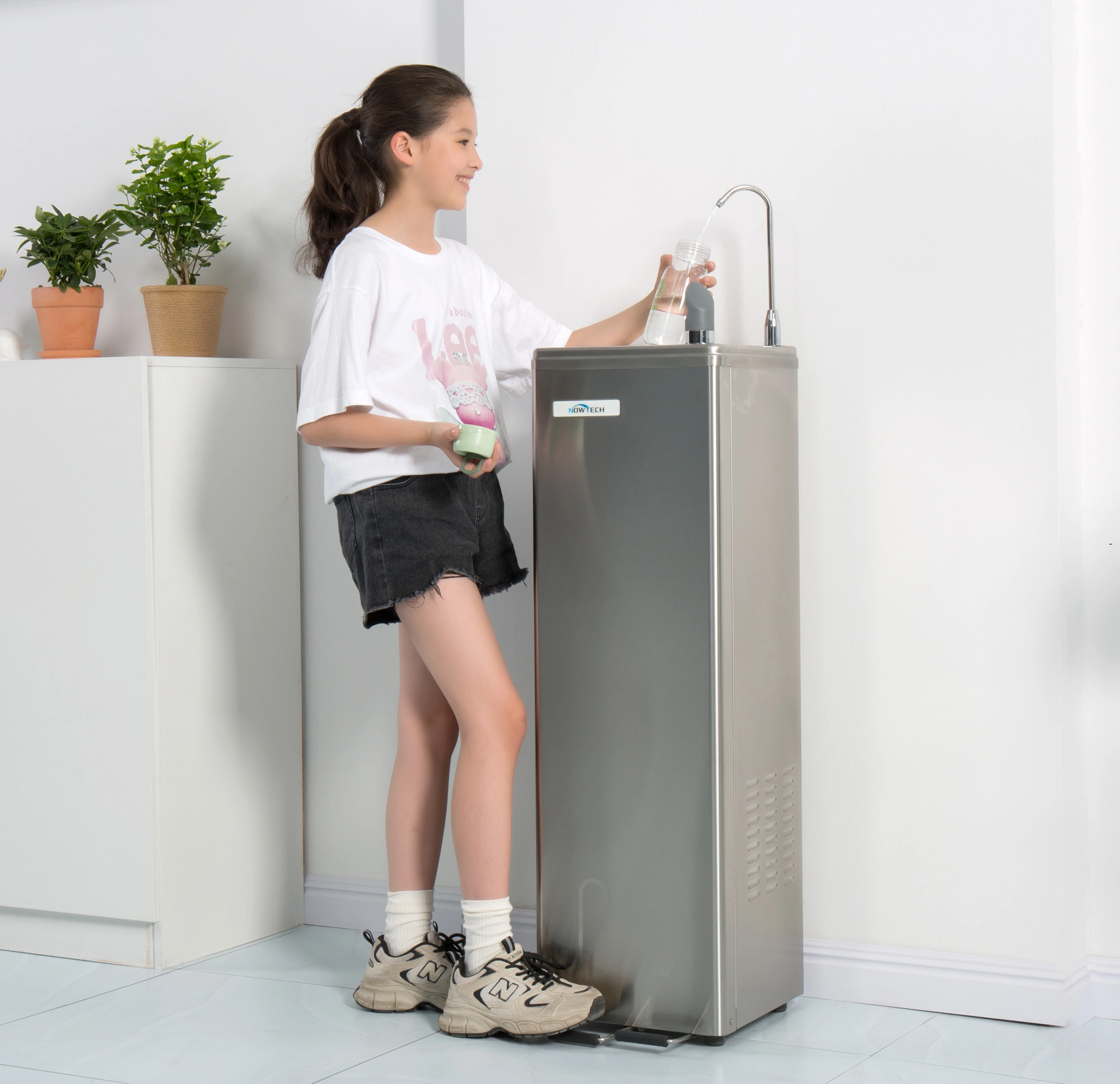 Polished Stainless Cabinet Foot pedal operated Bottle filler Ideal as a School Gym Factory drinking fountain