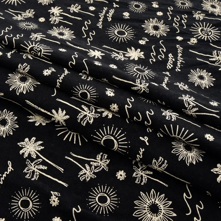 OEM factories black small flower printed 100% cotton knitted single jersey fabric with high quality