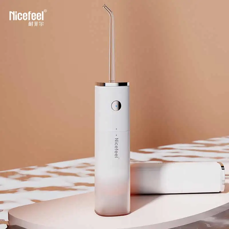 Nicefeel 77ml Waterproof IPX7 Mini travel jet electronic pocket water flosser with brush
