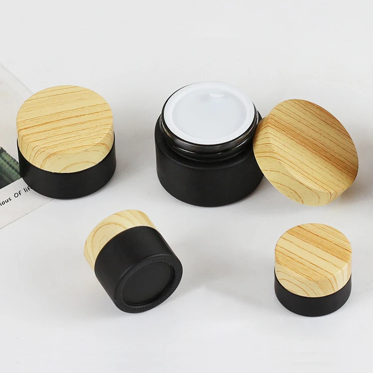 Matte black coating face cream jar skincare containers 20g 30g 50g cosmetic packaging cream jars with bamboo grain lid glass jar