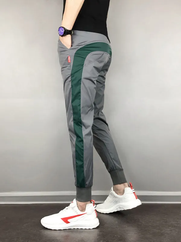 FanLi Men Loose Fit Reflective Printing Drawstring Windbreaker Mesh Lined Sport Track Pants