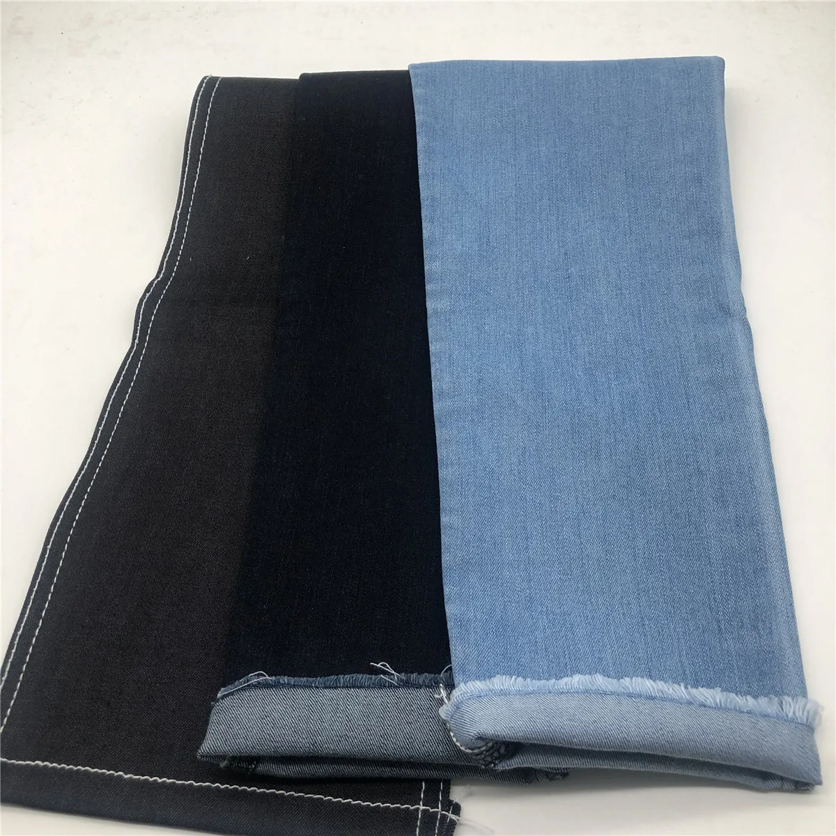 9.25oz blue black col cotton sorbtek repreve stretch denim fabric 8300 meters in stock