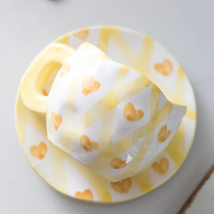 Modern nordic cute irregular flower design custom 200ml porcelain cup set ceramic pink expresso coffee cups with saucer