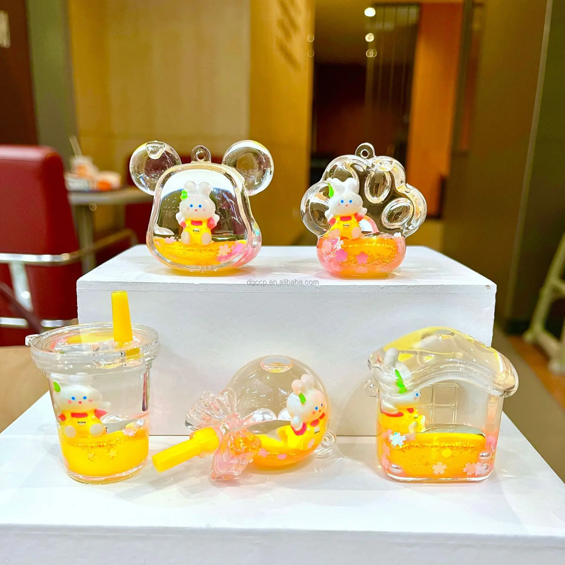 1batch=10PCS 100 design Cute Animal doll Liquid Floating Kawaii Acrylic Keychain bag Pendant Charm Key Ring for Girl Women