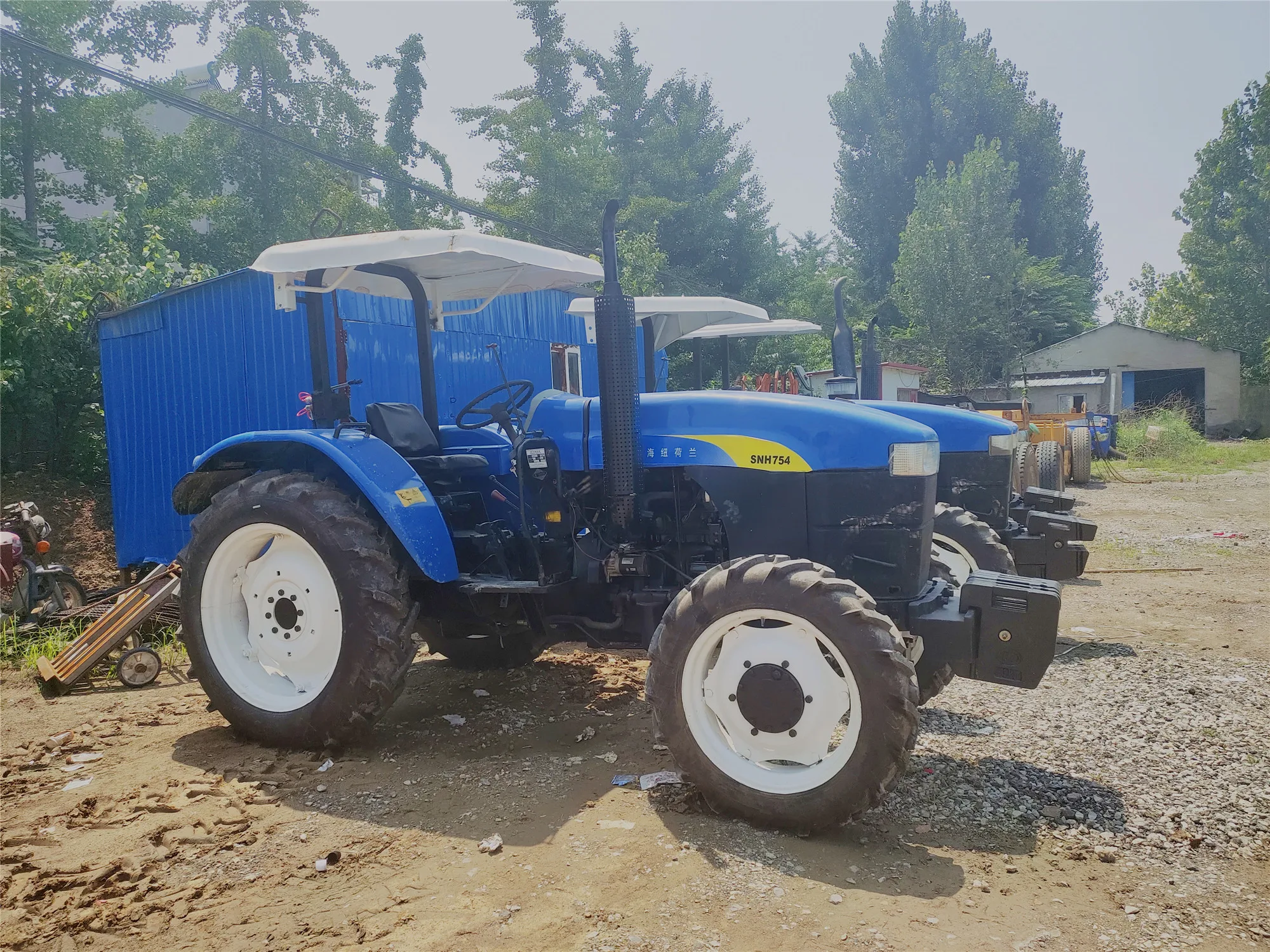 Farm Agricultural Machinery New and Holland SNH704 SNH754 70hp 75hp 4 Wheeled Drive Used Tractor with ROPS and Canopy