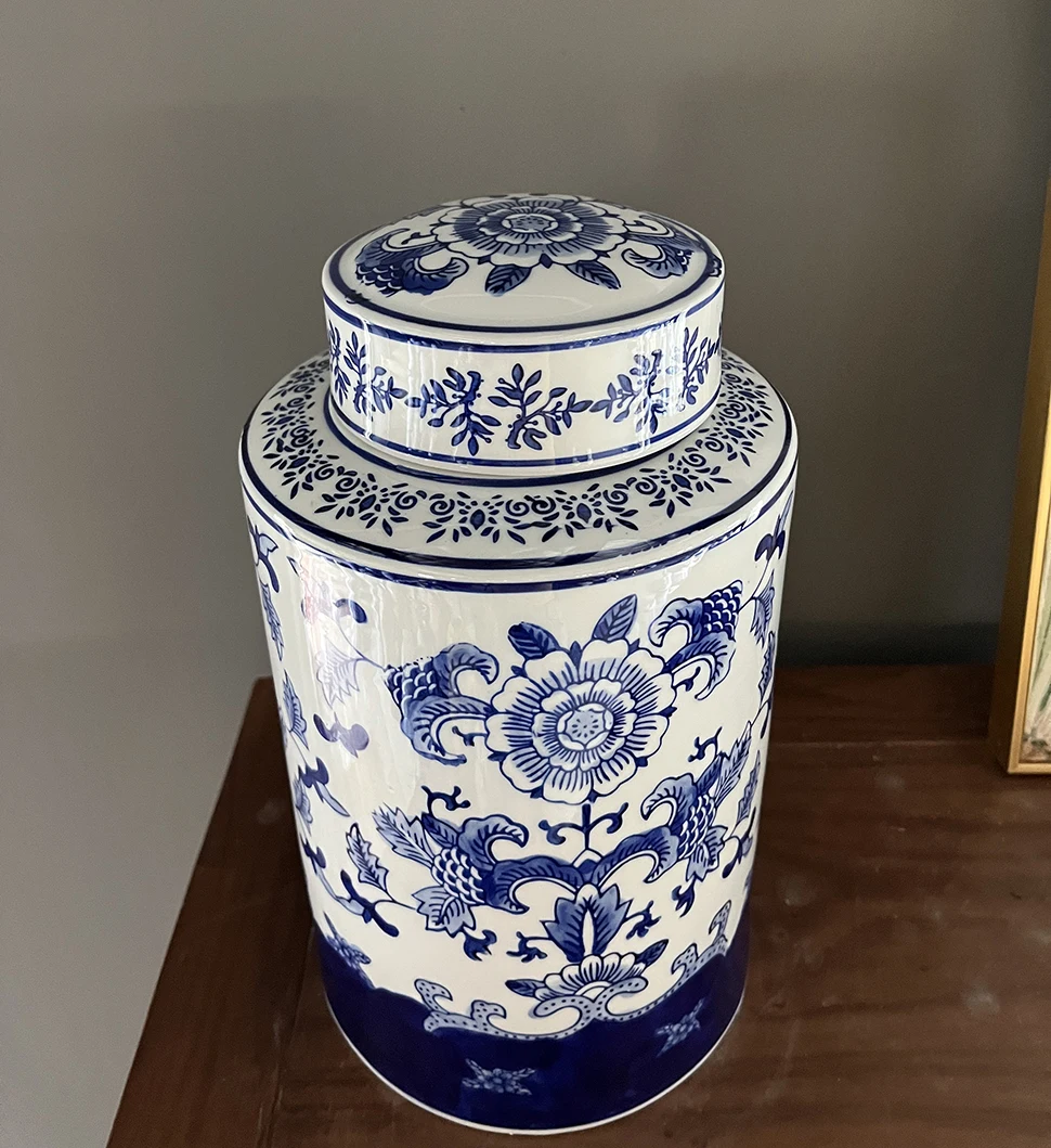 Porcelain Ginger Jar with Blue and White Peony Design A Dutch Delft blue and white baluster vase and cover
