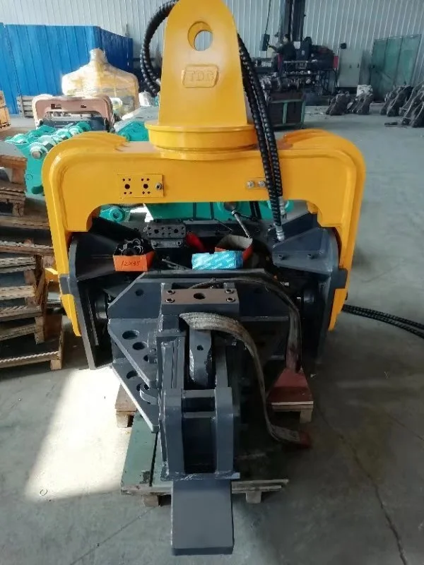 Mini excavator heavy duty vibratory hammer using pile driver hydraulics