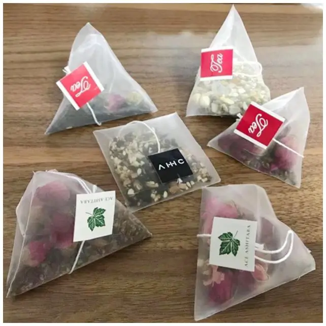 Automatic Triangle Pyramid Tea Bag Packing Machine Nylon PLA Silk Tea Bag Packing Machine Herbal Leaf Teabag Packaging Machine