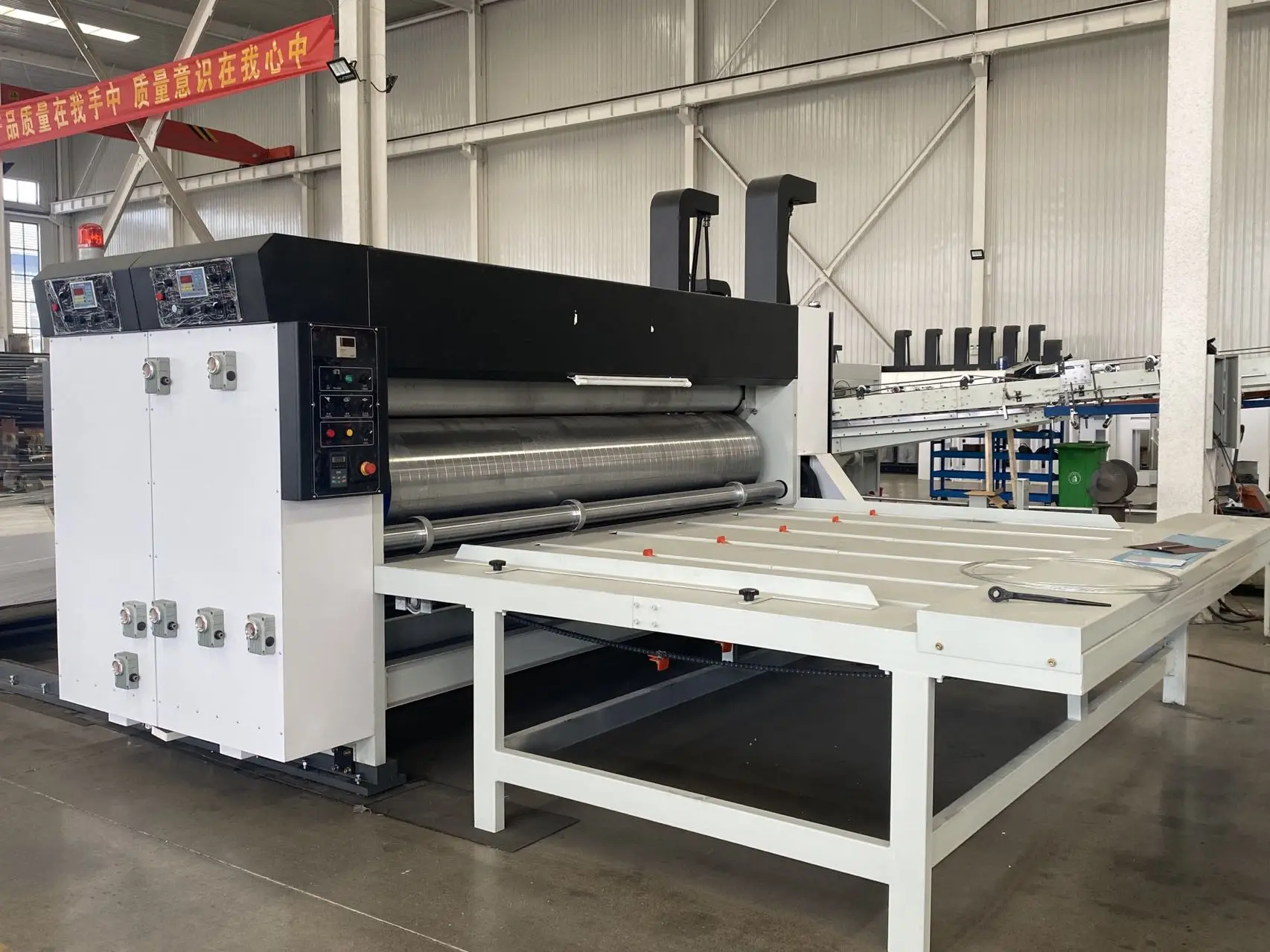 Semi automatic flexo 4 colors printing slotting and die cutting machine cardboard box  making machine Cangzhou cartoon machinery