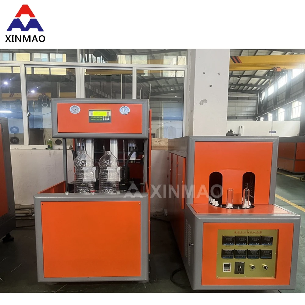 China Supplier Xinmao-1500 Semi-Auto Electric PET Bottle Blowing Machine Plastic Water Bottle Blowing Machine