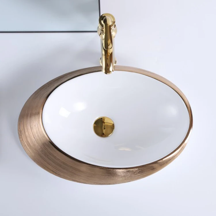 hot sale home modern brushed gold oval ceramic above countertop sink bathroom hand wash basin