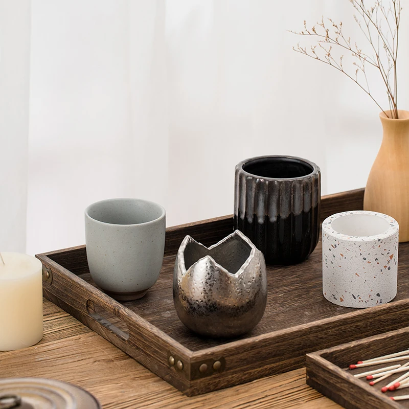 Classic wholesale cheap unique shape frosted matte black empty candle jars ceramic candle vessels