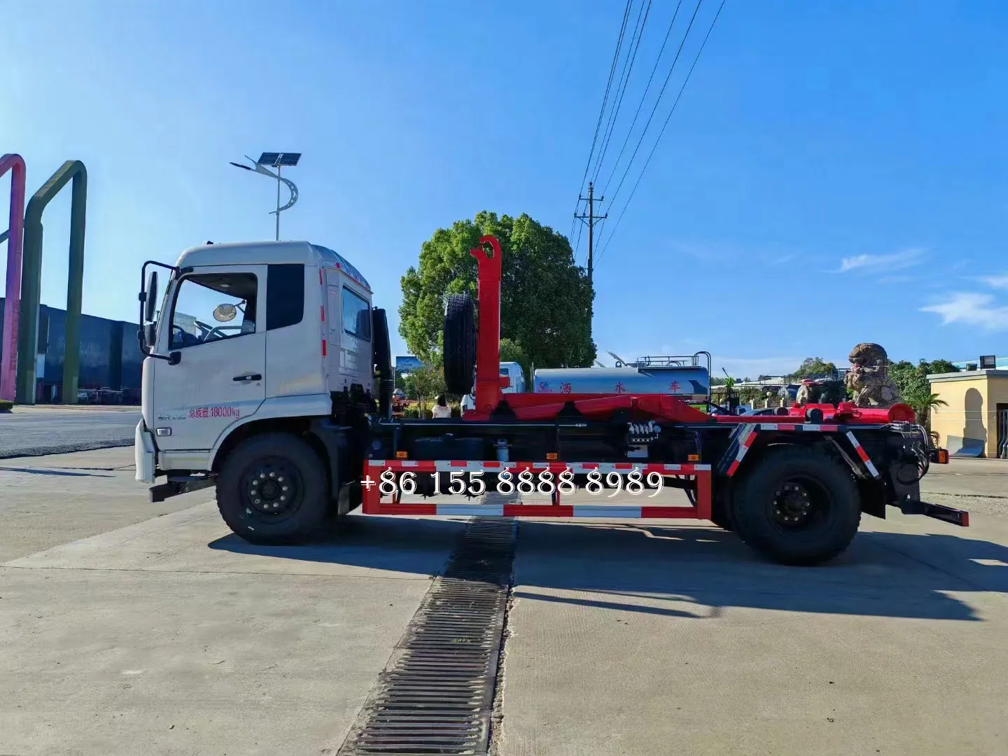 Мусоровоз Dongfeng 4x2 с крюком