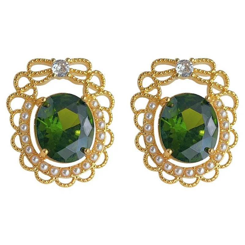 Женские серьги с изумрудом