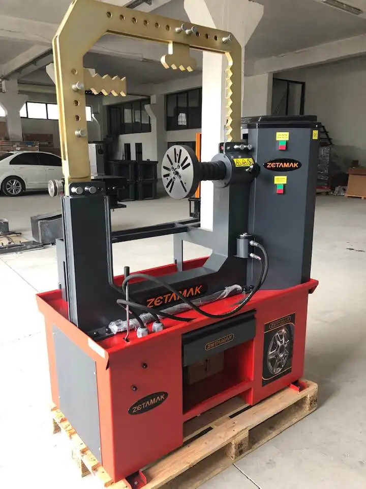 Машина для выпрямления обода zetмак с системой токарного станка синего цвета