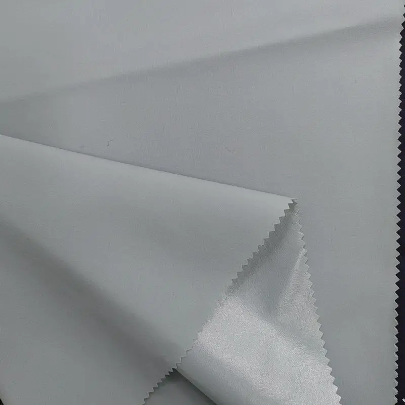 Breathable TPU Clear Membrane Laminated 4 Way Stretch Nylon Spandex Woven Waterproof Fabric for Raincoat