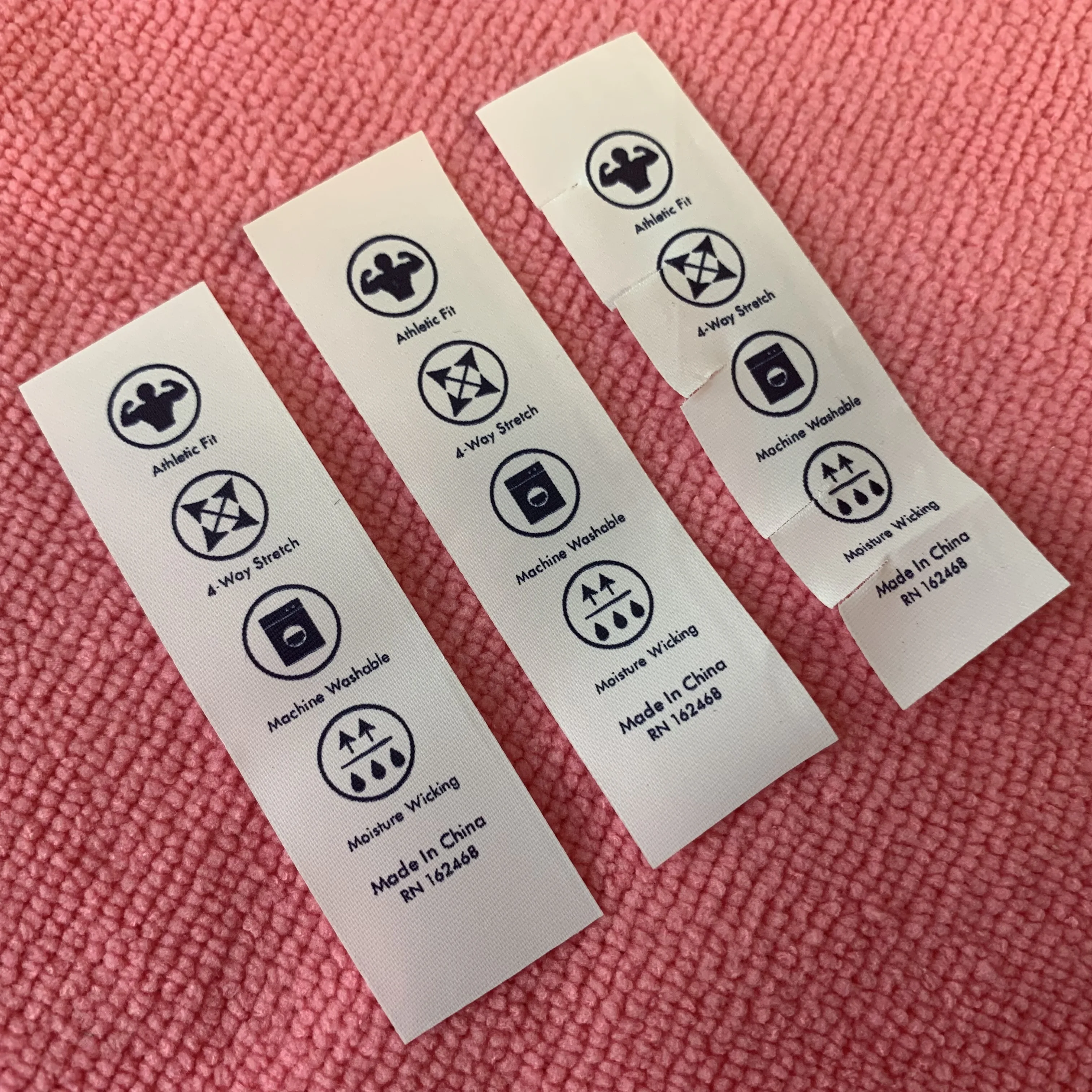 peel off washing instruction black tearaway fabric label,free sample tear away washing tags