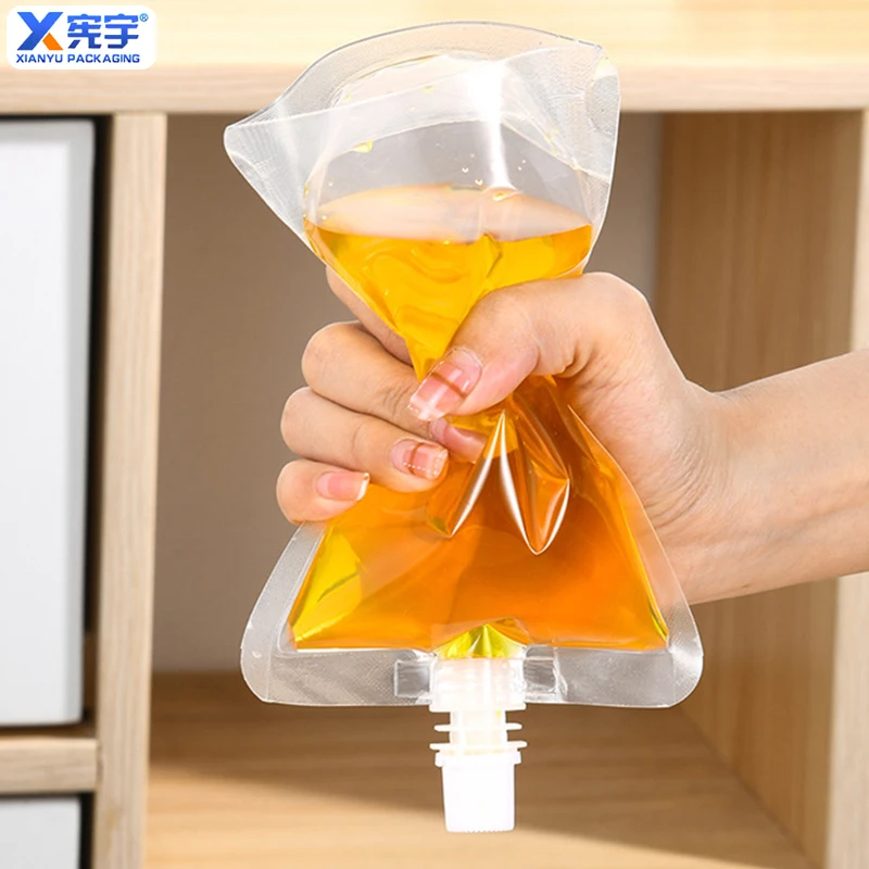 100pcs Clear Plastic Liquid Drink Juice Milk Coffee Stand up Nozzle Pouch Packaging With Spout 250ml 100ml 500ml Free Funnel