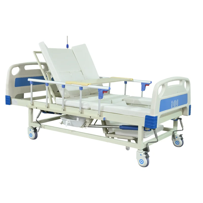Manufacture cheap backrest semi bending homecare functions manual nursing bed with washbasin potty hole