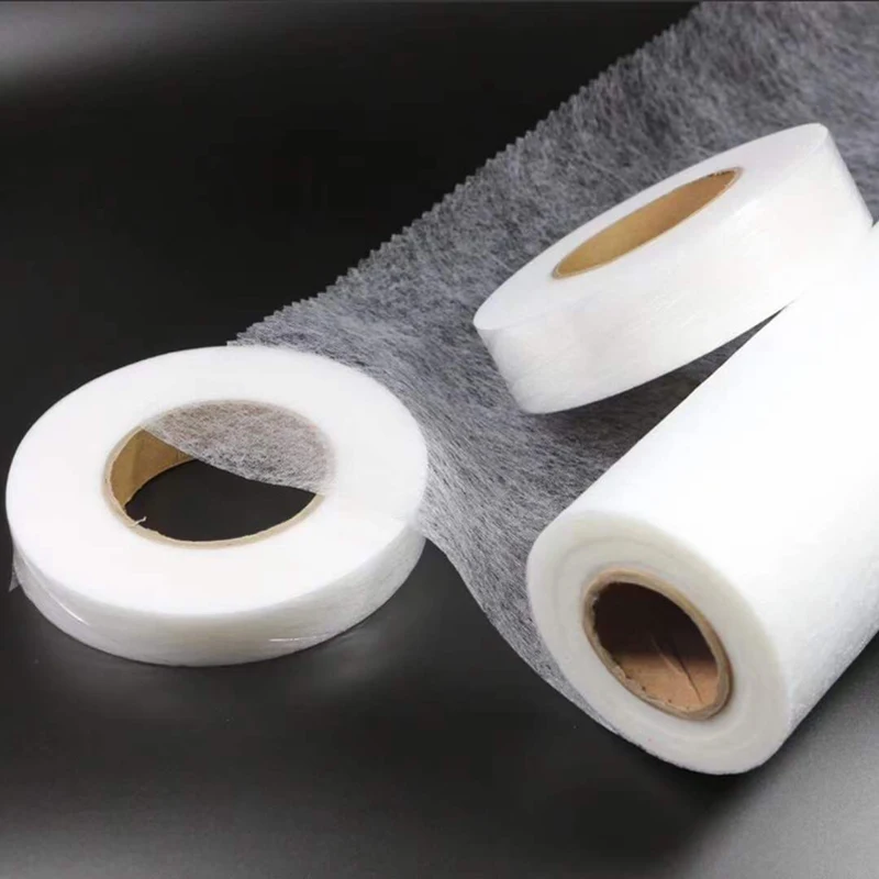 Hot melt adhesive web used for bonding fabrics together