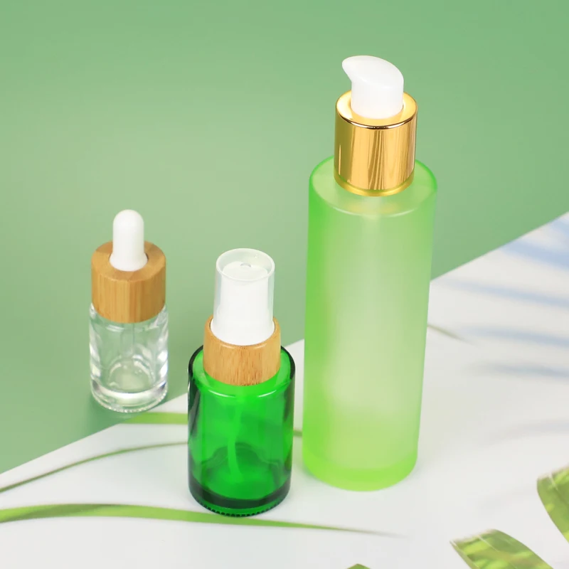 
Factory Custom Gold Cap Green Clear 100ml Glass Dropper Bottle Glass Lotion Pump Bottle 