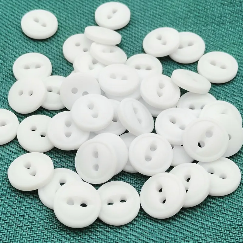 18L 11.5mm 2 holes fish eye resin button with rim in dull white color, dyeable resin button