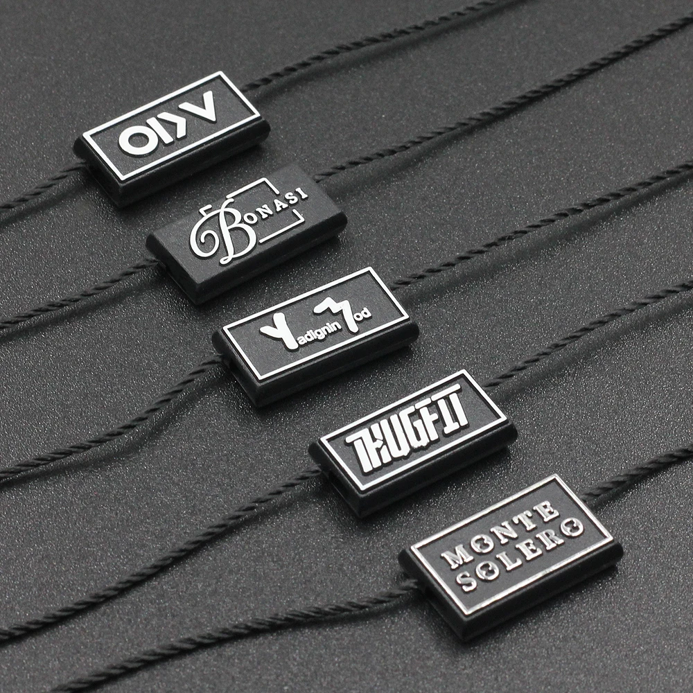 Custom gold logo label design plastic seal tag garment plastic hang tag with string