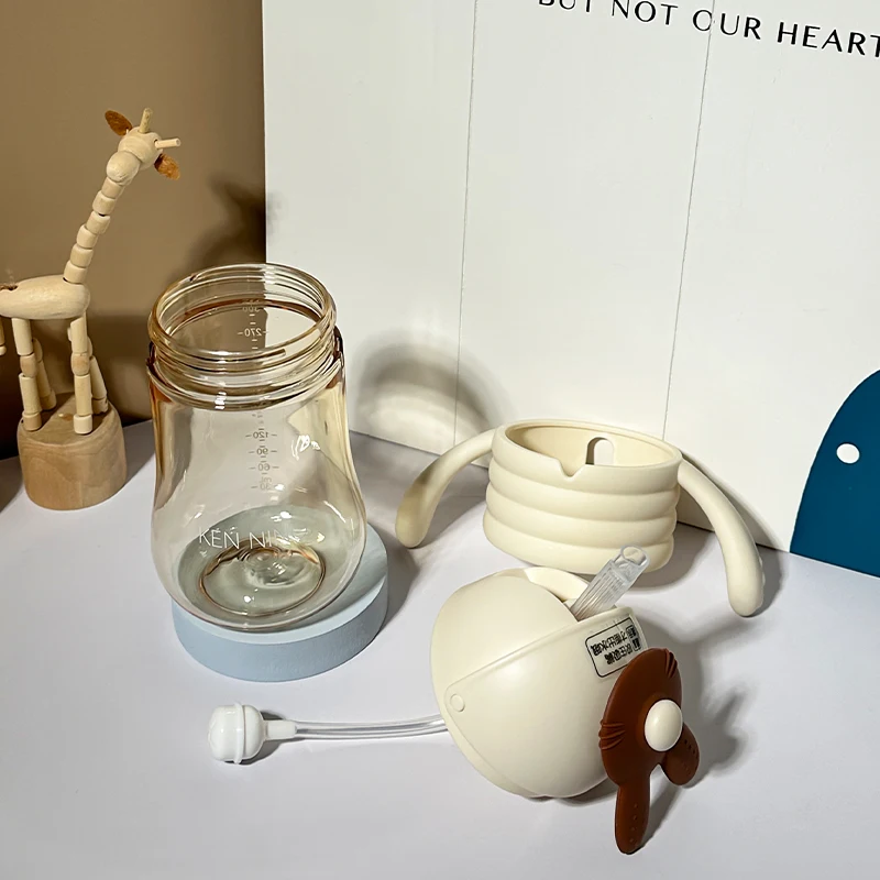 Hot Selling 300ml Baby Feeding Training Cup with Handle and Drinking Straw for Kids and Baby Water Bottle