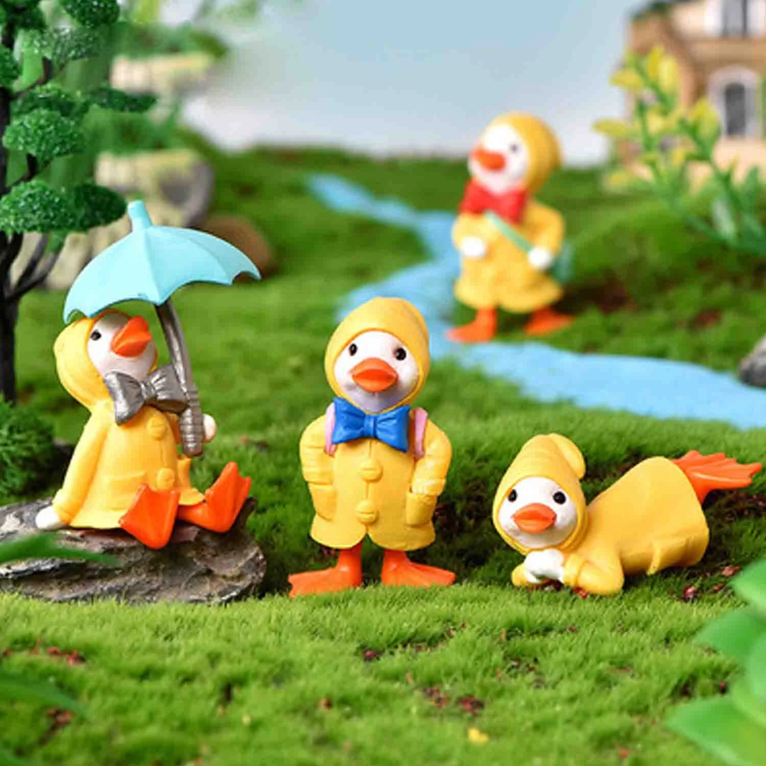 Manufacturers direct raincoat duckling micro landscape DIY gardening ornaments umbrella raincoat lovely duck plastic crafts