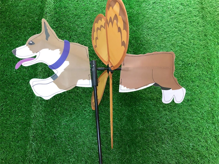 Puppy windmill that makes people love it, children holding toys, scene decoration windmill