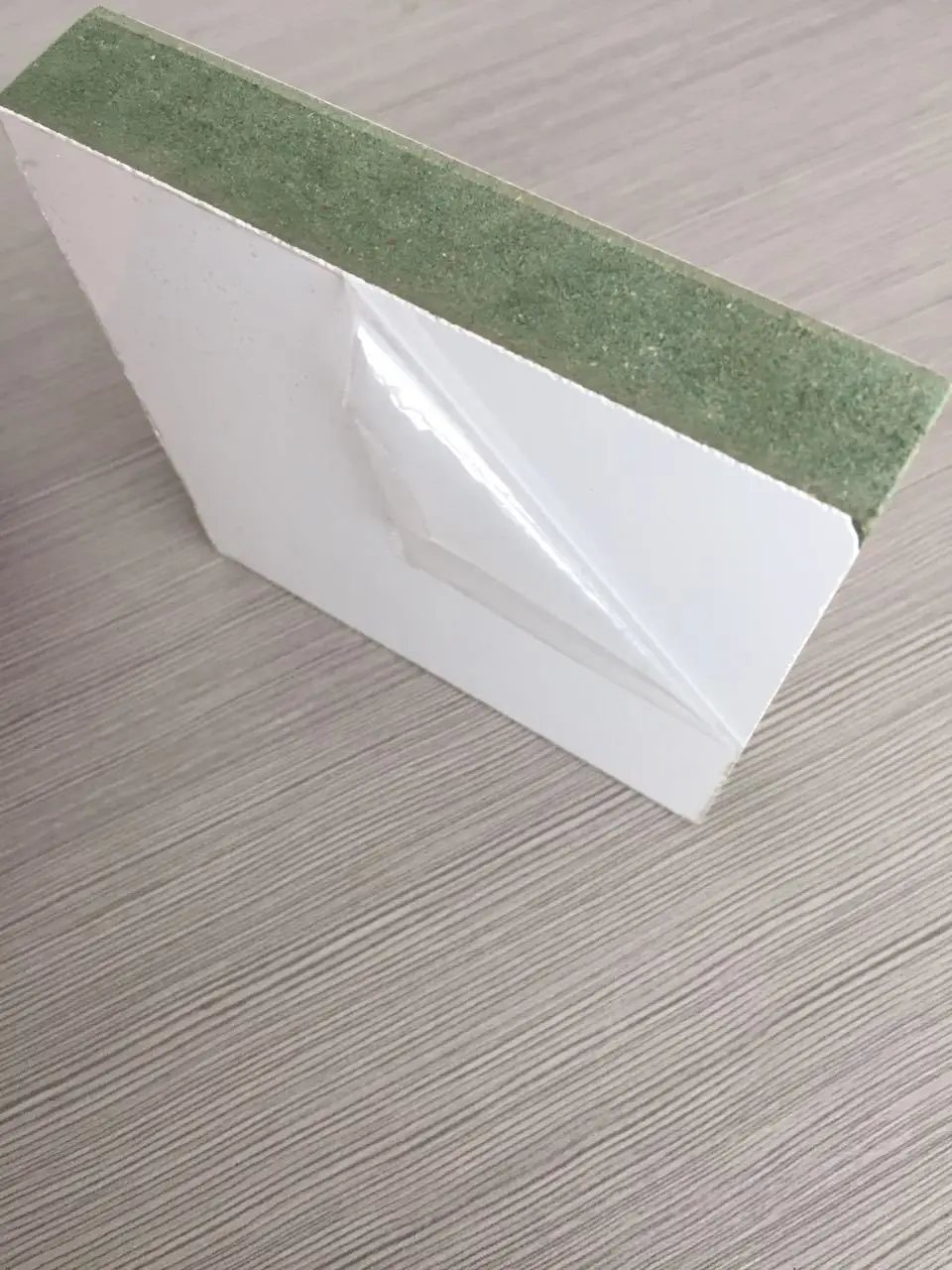 Soft Melamine MDF Board 50cm Width PE Protection Film Surface Covering Blow Molding Logo Good Weatherability No Glue Residue