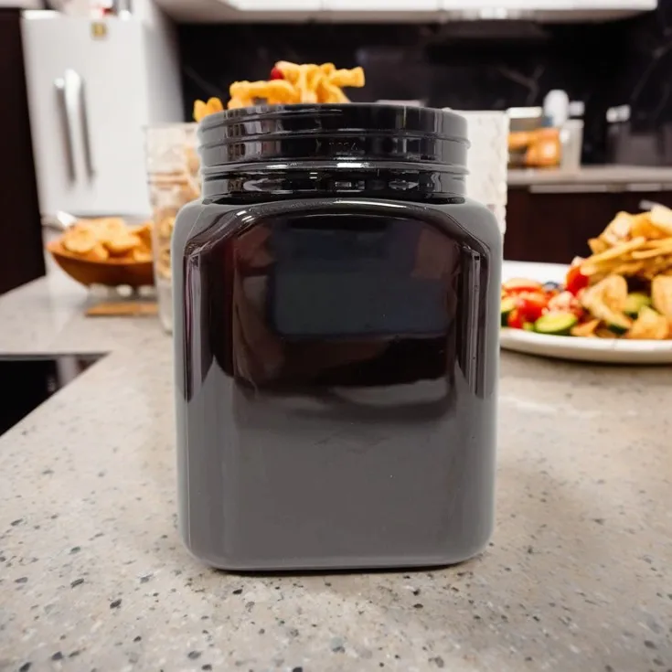 High Quality Anti-Theft 720ml Black Amber Color Honey & Candy Jar Plastic 24oz PET Jar Food Storage Container