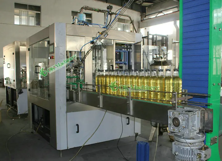 Automatic Rotary Type 0.5l-5l Pet Plastic Bottle Sun Flower Coconut Palm Oil Vinegar Filling Capping Labeling Packing Machine
