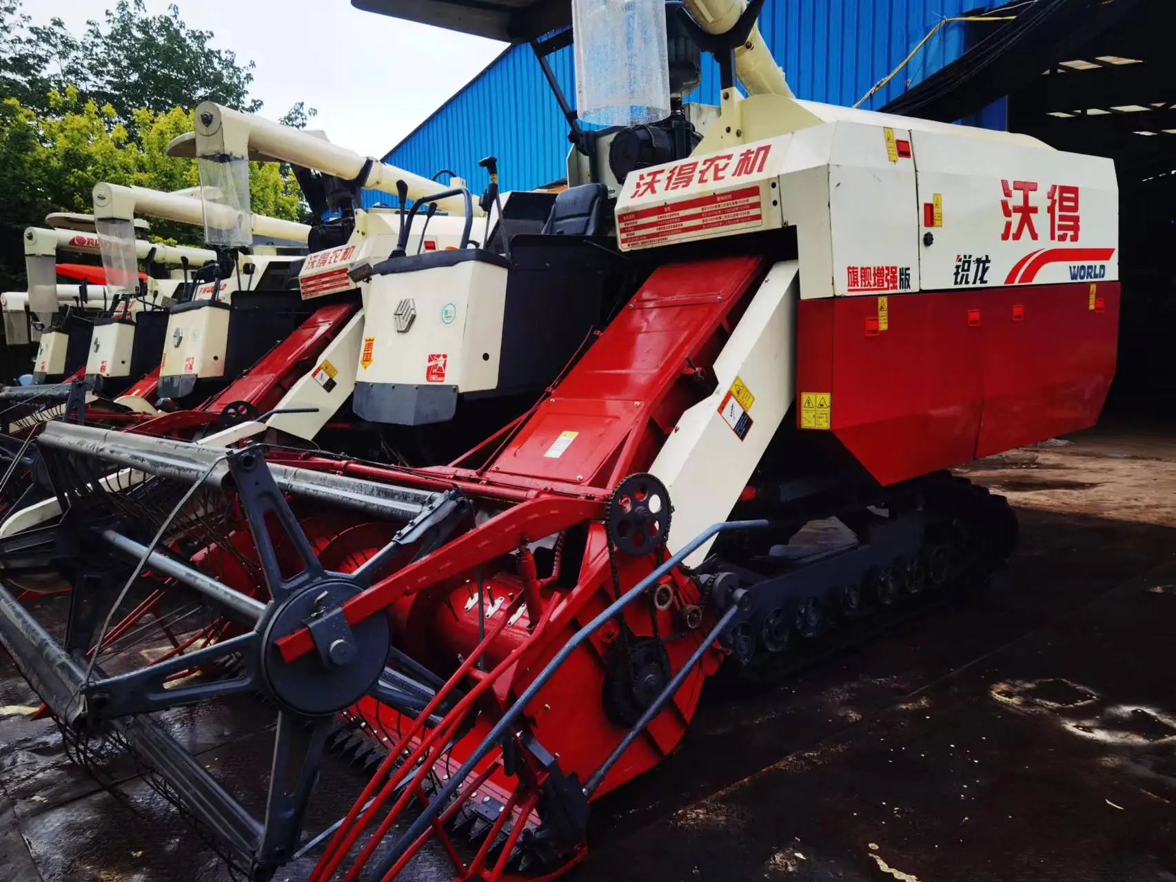 low price Chassis raised world  112HP rice and wheat combine harvester