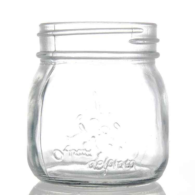Manufacturer wholesale glass carved honey jar canned pickles canned peach embossed pattern to sample processing custom
