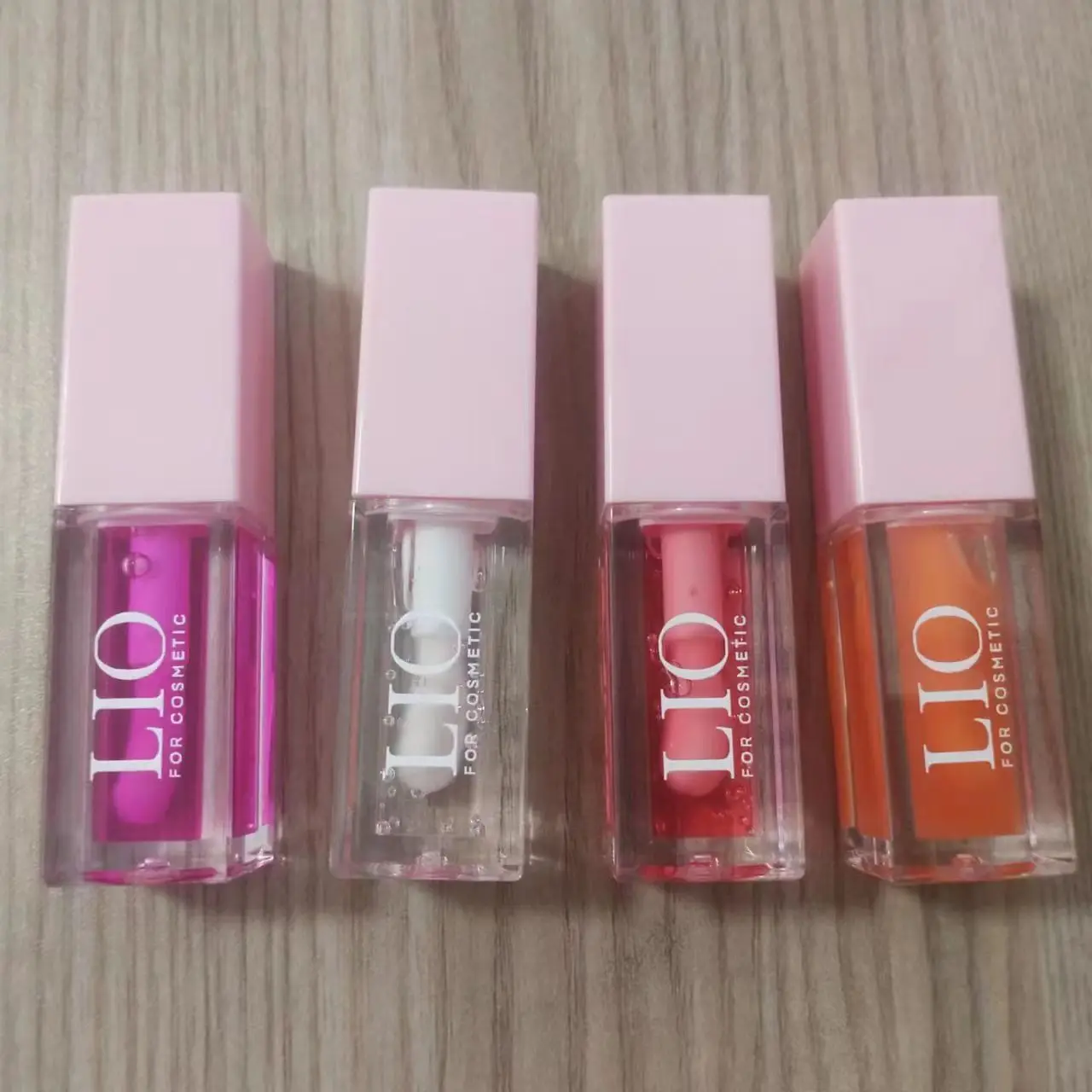 Private Label Vegan Beauty 10 Flavor Fruit Lip Oil Lip Plumper Lip Oil With Pink And White Lid Tube